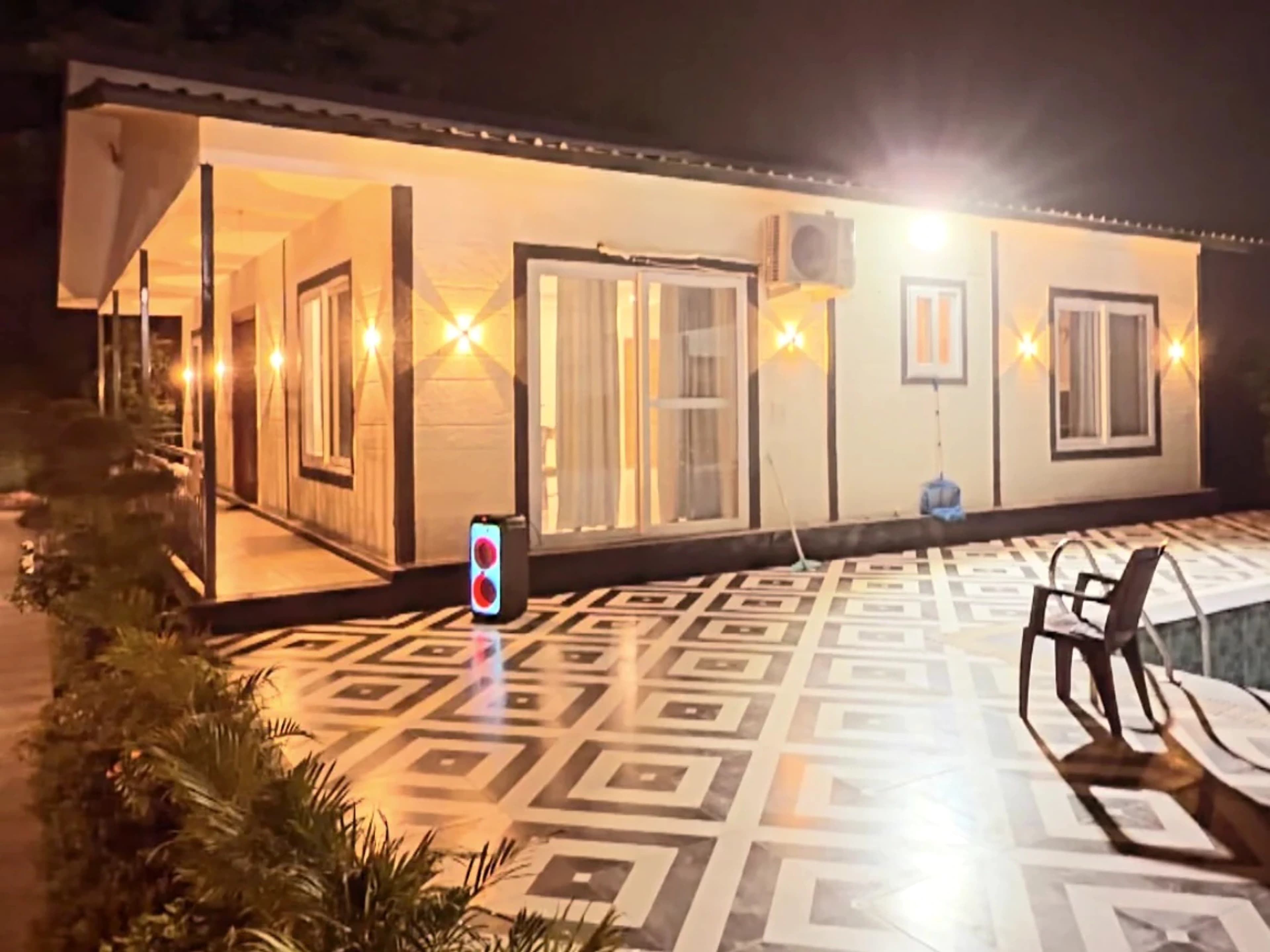 Illuminated evening view of Silver Oak Estate deck and building
